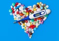 Thermometer and heart made of pills Royalty Free Stock Photo