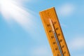 Thermometer with a high temperature reading on a scale Royalty Free Stock Photo