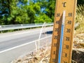 Thermometer on hot summer day Royalty Free Stock Photo