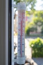 Thermometer indicating high temperature. Heat in the city is a threat to residents Royalty Free Stock Photo