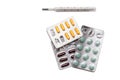 Thermometer and Packs of Pills Royalty Free Stock Photo