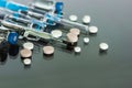 Thermometer, pills, injection vaccine ampoules, syringe for vaccination on glass background, Coronavirus, MERS-CoV, air