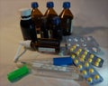 Thermometer, pills and medicine vials Royalty Free Stock Photo