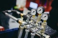 Thermometer, pipes and faucet valves of heating system in a boiler room Royalty Free Stock Photo