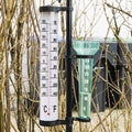 Thermometer and pluviometer Royalty Free Stock Photo