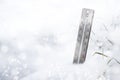 Thermometer in the snow during a cold snap in winter, concept for weather phenomena, climate change and rising heating costs, copy