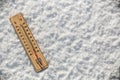 Thermometer in the snow with freezing temperatures Royalty Free Stock Photo