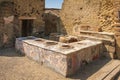 Thermopolium or tavern. Herculaneum. Naples. Italy Royalty Free Stock Photo