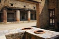 Thermopolium or tavern. Herculaneum. Naples. Italy Royalty Free Stock Photo