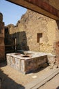 Thermopolium or tavern. Herculaneum. Naples. Italy Royalty Free Stock Photo