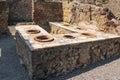 Thermopolium or tavern. Herculaneum. Naples. Italy Royalty Free Stock Photo