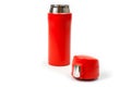 Thermos cup with red-orange vacuum lid for long-term storage of hot and cold drinks. For fitness and travel