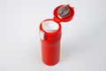 Thermos cup with red-orange vacuum lid for long-term storage of hot and cold drinks. For fitness and travel