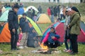 Hundreds of migrants and refugees gathered outside of a refugee camp in Diavata