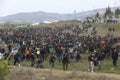 Hundreds of migrants and refugees gathered outside of a refugee camp in Diavata