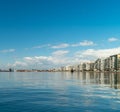 Thessaloniki / greece 11 april 2019 : shot of the beach of thessaloniki ,the port the buildings and the sun is making the day perf