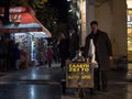 THESSALONIKI, GREECE - DECEMBER 25, 2015: Salep seller in the evening. Salep is a traditional Greek and Turkish drink made of a f