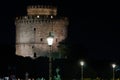 Thessaloniki Greece night view of The White Tower with Christmas lights decoration around.