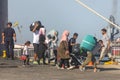 Refugees and migrants disembark to the port of Thessaloniki after being transfered from the refugee camp of Moria, Lesvos island