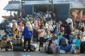 Refugees and migrants disembark to the port of Thessaloniki after being transfered from the refugee camp of Moria, Lesvos island