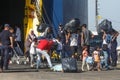 Refugees and migrants disembark to the port of Thessaloniki after being transfered from the refugee camp of Moria, Lesvos island Royalty Free Stock Photo