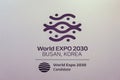 Busan, Korea World Expo 2030 Candidate banner with logo on display at an international fair