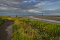 TheWadden Sea of the North Sea coast in Fedderwardersiel, Germany under scenic cloudy sky