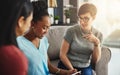 Theyre a close-knit team. businesswomen having a conversation in the office. Royalty Free Stock Photo