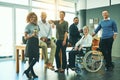 Theyre a diverse and dynamic team. Portrait of a group of businesspeople in an office. Royalty Free Stock Photo