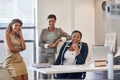 Theyre a dream team. Portrait of a group of female colleagues sitting together in an office.