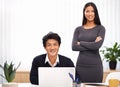 Theyre a dynamic corporate team. Portrait of two successful business professionals in an office. Royalty Free Stock Photo
