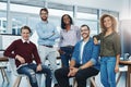 Theyre a group of go getters. Portrait of a team of young go getters working in a modern office. Royalty Free Stock Photo