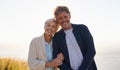 Theyre proud of their strong marriage. View of a senior couple standing on a hillside together.