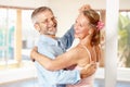 Theyve been dancing like this for years. Shot of a mature couple ballroom dancing together indoors. Royalty Free Stock Photo