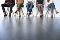 Theyve made the cut. a group of diverse people waiting in line to be interviewed. Royalty Free Stock Photo