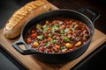 A thick beef stew with potatoes, slow-cooked in a crock pot, and served alongside toast Royalty Free Stock Photo