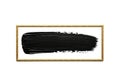 Thick black paint stroke in a golden frame isolated on white background Royalty Free Stock Photo