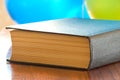 Thick book on a polished table Royalty Free Stock Photo