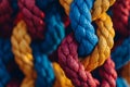 Thick, brightly colored ropes interlock in close proximity creating a compelling textural pattern Royalty Free Stock Photo
