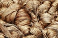 Thick brown bundle of raw jute fiber