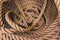 Thick brown rope rolled into a roll