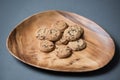 Chocolate chip cookies on an acacia wood platter Royalty Free Stock Photo