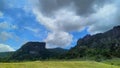 Thick clouds in between hills of Mundo Perdido, Timor-Leste Royalty Free Stock Photo