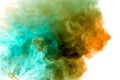 A thick column of smoke rises up as a cloud exhaled from a vape on a white background is highlighted in yellow and blue Royalty Free Stock Photo