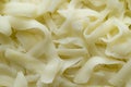 Thick cut grated mozzarella cheese food background