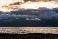 Thick dark thunderclouds above the sea