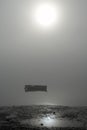 Thick fog hanging over the Thames Estuary, enveloping a boat in Southend on Sea