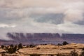 Thick Fog Spills Over The White Rim In Canyonlands Royalty Free Stock Photo