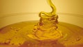 Thick golden honey flowing into a glass. A jet of fresh organic honey molasses pours close up. Sweet product of
