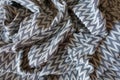 Thick gray patterned fabric in soft folds